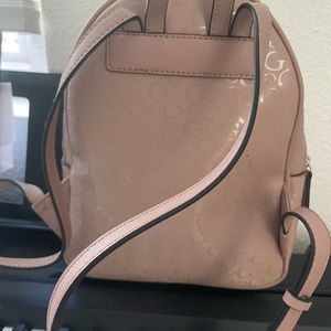Guess Signature Middle Travel Backpack Collor Taupe. Great condition.
